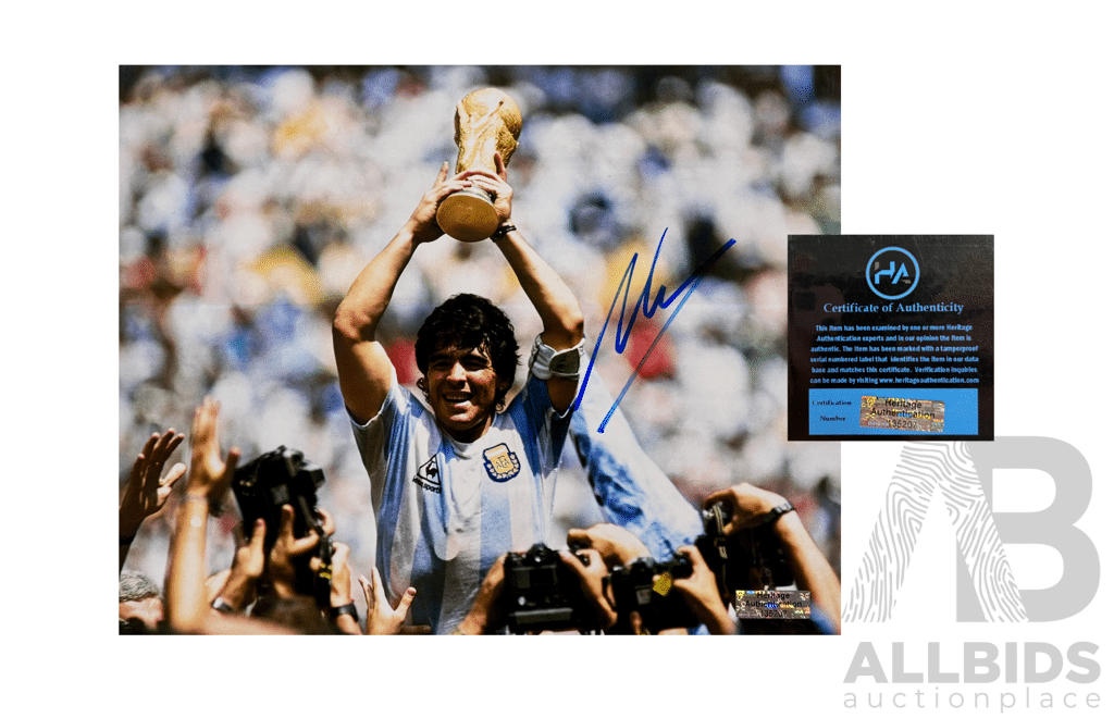 Iconic Signed Photo of Diego Maradona Holding the World Cup Trophy, With Certificate of Authenticity.