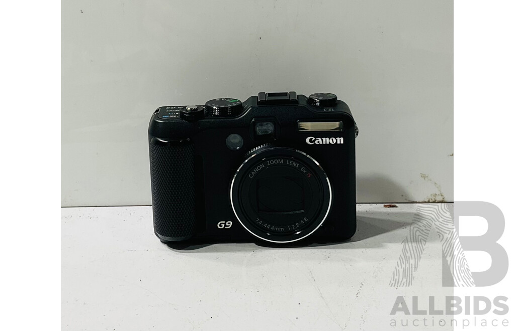 Cannon Powershot G9 Point & Shoot Camera with Lens Hood, Battery, Charger and Instruction Manual