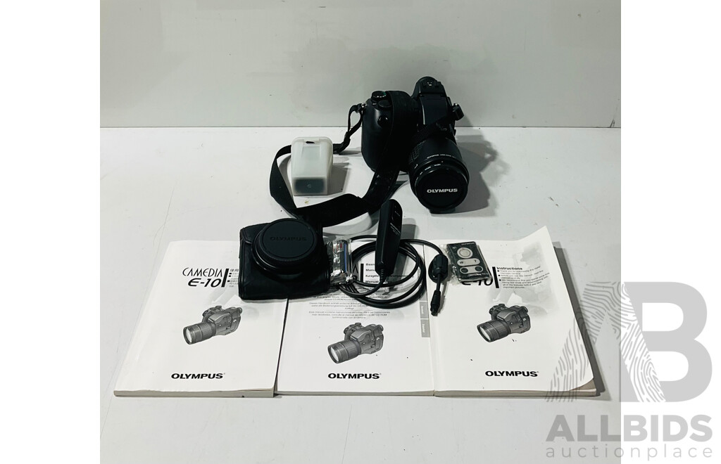 Olympus Digital SLR Camera Model Camedia E10, 2001, Includes Remote Cable, Close Up Lens, Instruction Manual, Spare Battery & Holder