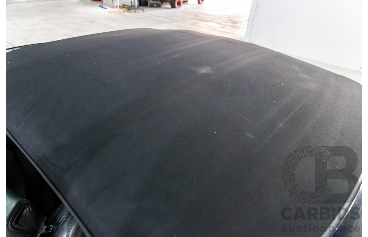 9/2005 Mercedes-Benz CLK350 Elegance C209 MY06 2d Cabriolet Obsidian Black Metallic V6 3.5L