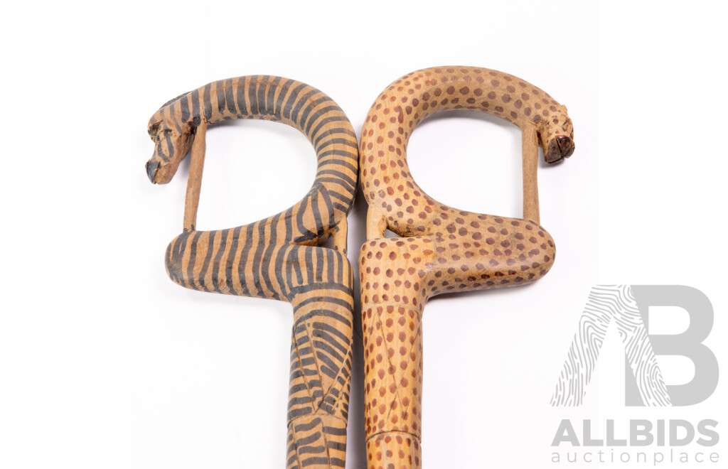 Two Hand Carved African Wooden Walking Sticks Comprising Leopard and Zebra Examples