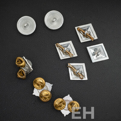 Collection of Stokes & Parkes Silver Tone Buttons and Australian Army Officer Rank Anondised Pips