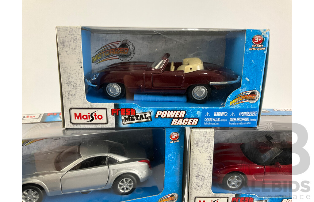 Eight Maisto Diecast Fresh Metal Power Racers Including Corvette, Jaguar, with Display Case Parts