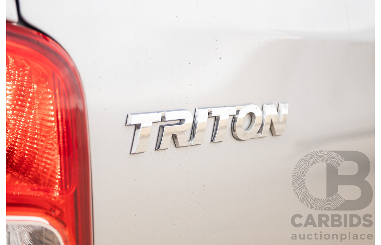 02/2016 Mitsubishi Triton GLX (4x4) MQ MY16 Upgrade Dual Cab Utility Silver Turbo Diesel 2.4L