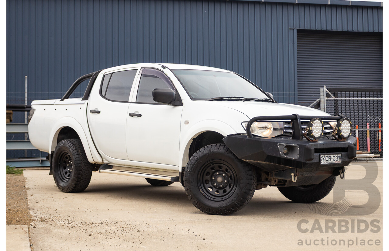 9/2014 Mitsubishi Triton GLX (4x4) MN MY14 UPDATE Double Cab Utility White Turbo Diesel 2.5L