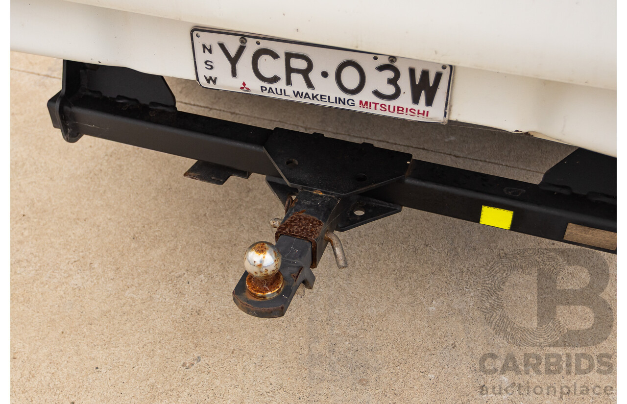 9/2014 Mitsubishi Triton GLX (4x4) MN MY14 UPDATE Double Cab Utility White Turbo Diesel 2.5L