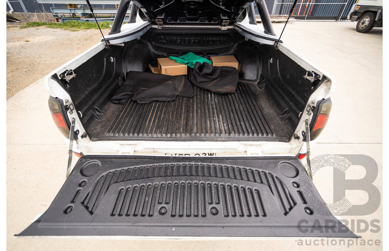 9/2014 Mitsubishi Triton GLX (4x4) MN MY14 UPDATE Double Cab Utility White Turbo Diesel 2.5L