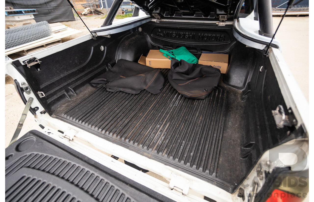 9/2014 Mitsubishi Triton GLX (4x4) MN MY14 UPDATE Double Cab Utility White Turbo Diesel 2.5L