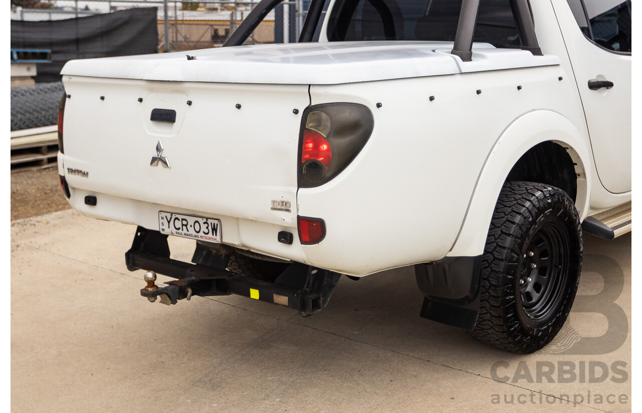 9/2014 Mitsubishi Triton GLX (4x4) MN MY14 UPDATE Double Cab Utility White Turbo Diesel 2.5L