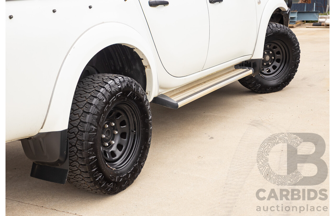 9/2014 Mitsubishi Triton GLX (4x4) MN MY14 UPDATE Double Cab Utility White Turbo Diesel 2.5L