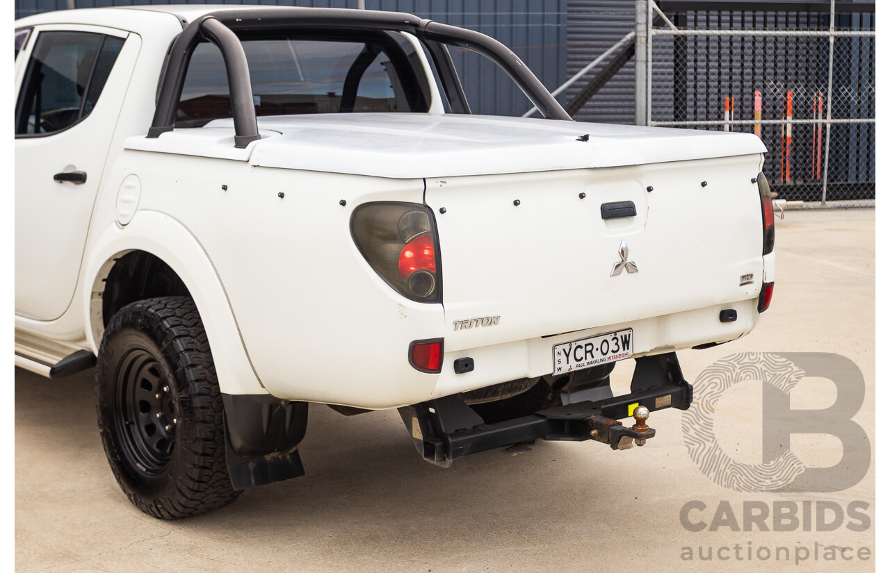 9/2014 Mitsubishi Triton GLX (4x4) MN MY14 UPDATE Double Cab Utility White Turbo Diesel 2.5L
