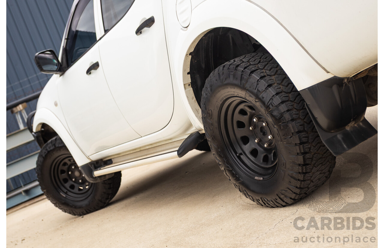 9/2014 Mitsubishi Triton GLX (4x4) MN MY14 UPDATE Double Cab Utility White Turbo Diesel 2.5L