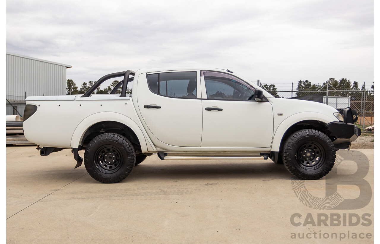 9/2014 Mitsubishi Triton GLX (4x4) MN MY14 UPDATE Double Cab Utility White Turbo Diesel 2.5L