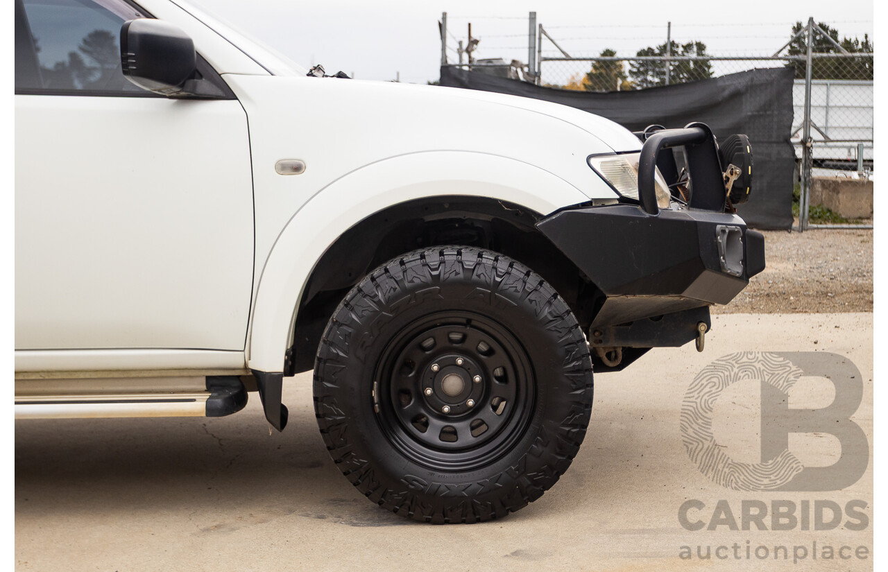 9/2014 Mitsubishi Triton GLX (4x4) MN MY14 UPDATE Double Cab Utility White Turbo Diesel 2.5L