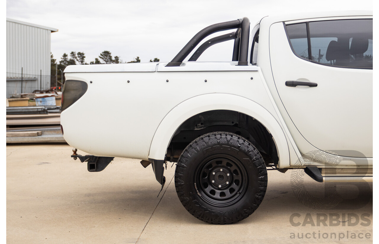 9/2014 Mitsubishi Triton GLX (4x4) MN MY14 UPDATE Double Cab Utility White Turbo Diesel 2.5L