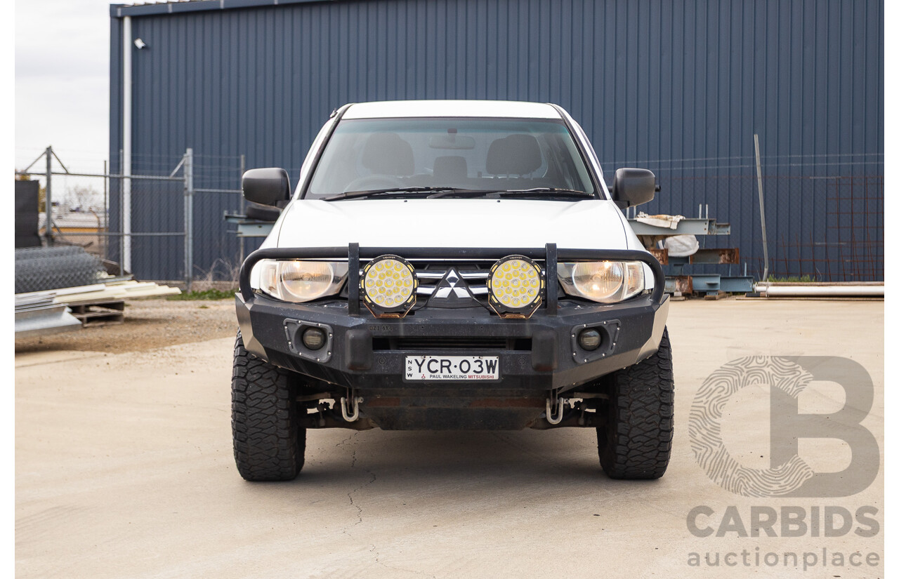 9/2014 Mitsubishi Triton GLX (4x4) MN MY14 UPDATE Double Cab Utility White Turbo Diesel 2.5L