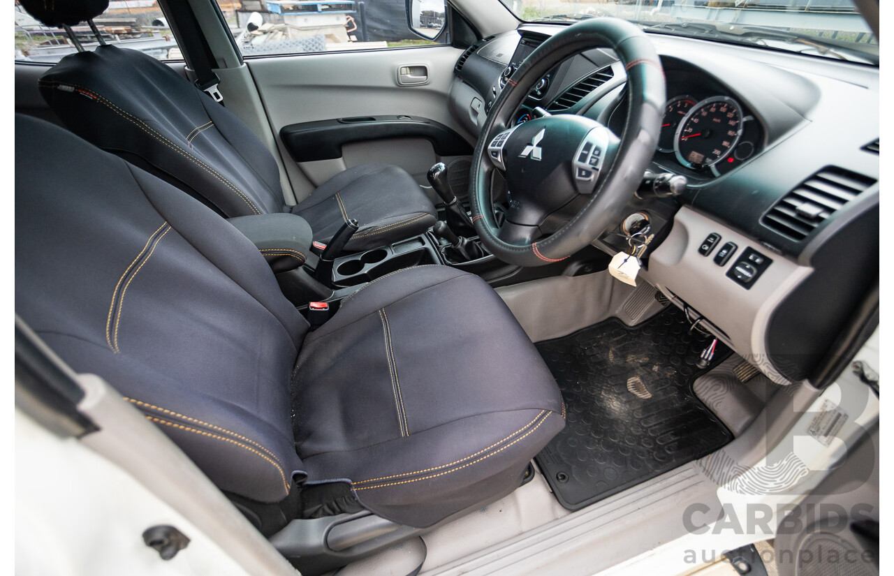 9/2014 Mitsubishi Triton GLX (4x4) MN MY14 UPDATE Double Cab Utility White Turbo Diesel 2.5L