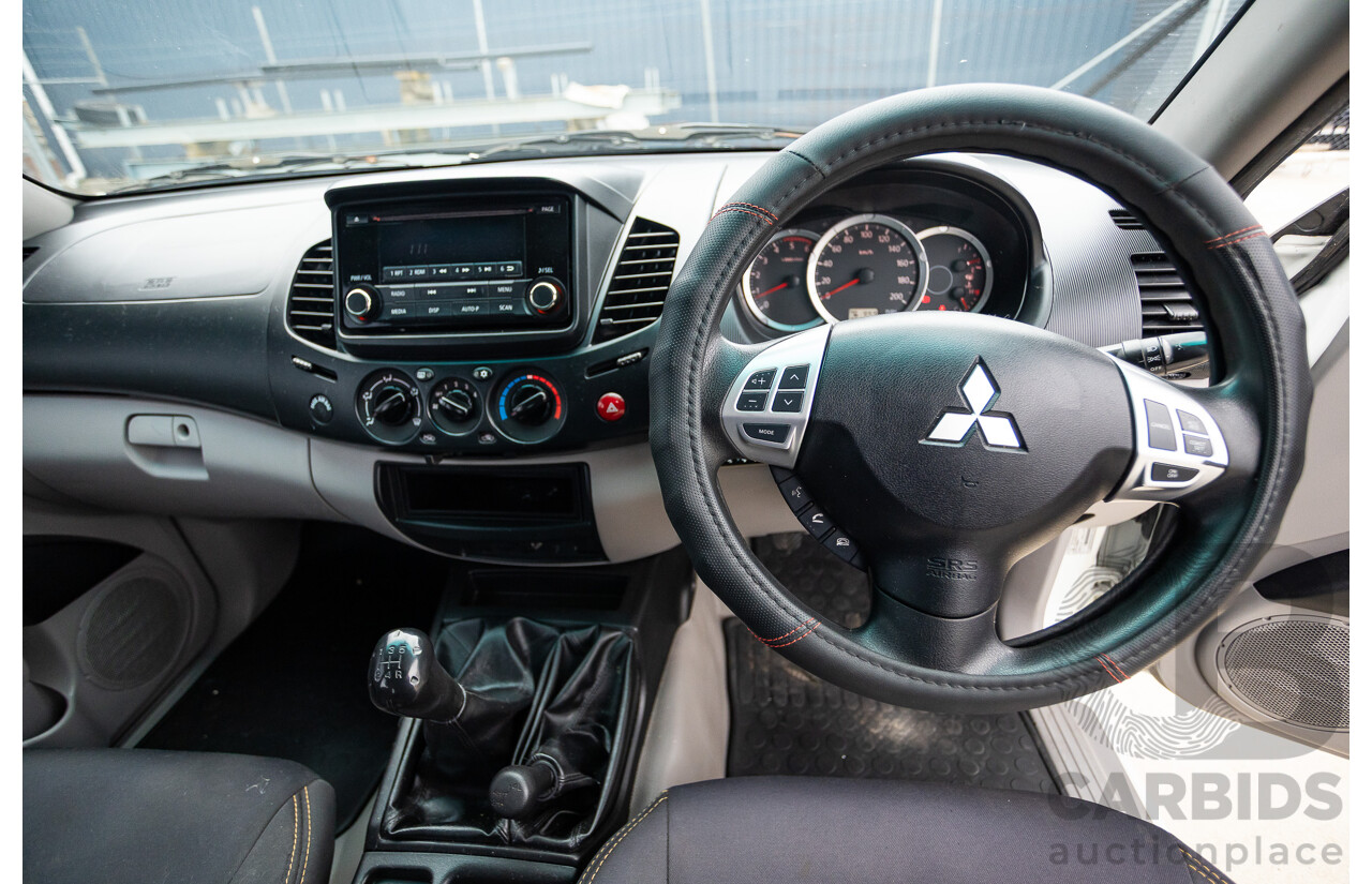 9/2014 Mitsubishi Triton GLX (4x4) MN MY14 UPDATE Double Cab Utility White Turbo Diesel 2.5L