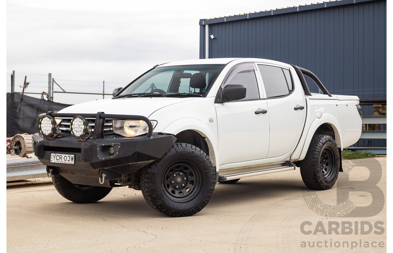9/2014 Mitsubishi Triton GLX (4x4) MN MY14 UPDATE Double Cab Utility White Turbo Diesel 2.5L
