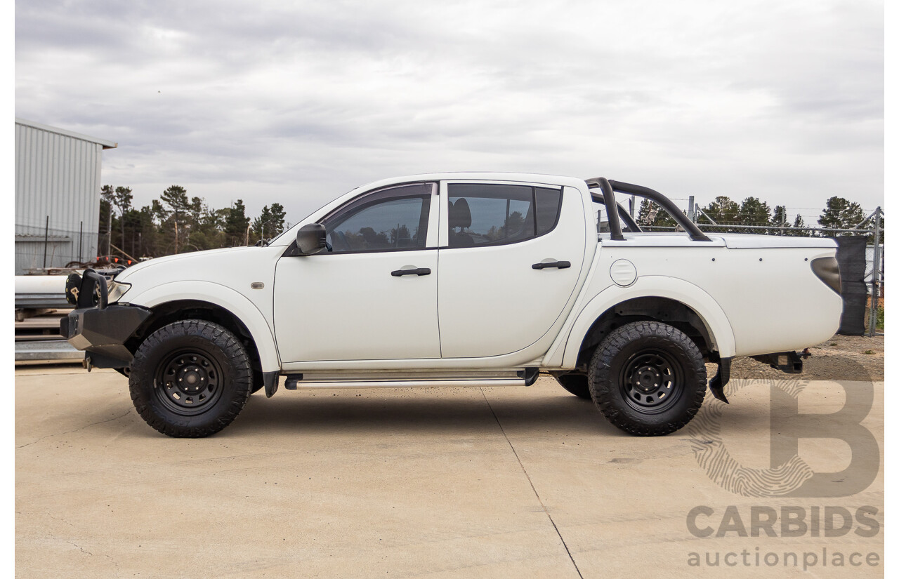 9/2014 Mitsubishi Triton GLX (4x4) MN MY14 UPDATE Double Cab Utility White Turbo Diesel 2.5L