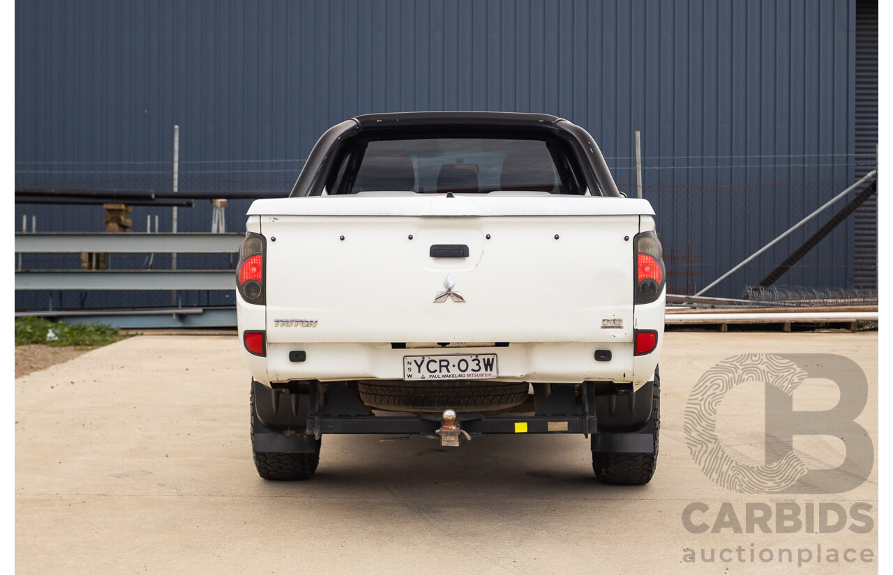 9/2014 Mitsubishi Triton GLX (4x4) MN MY14 UPDATE Double Cab Utility White Turbo Diesel 2.5L