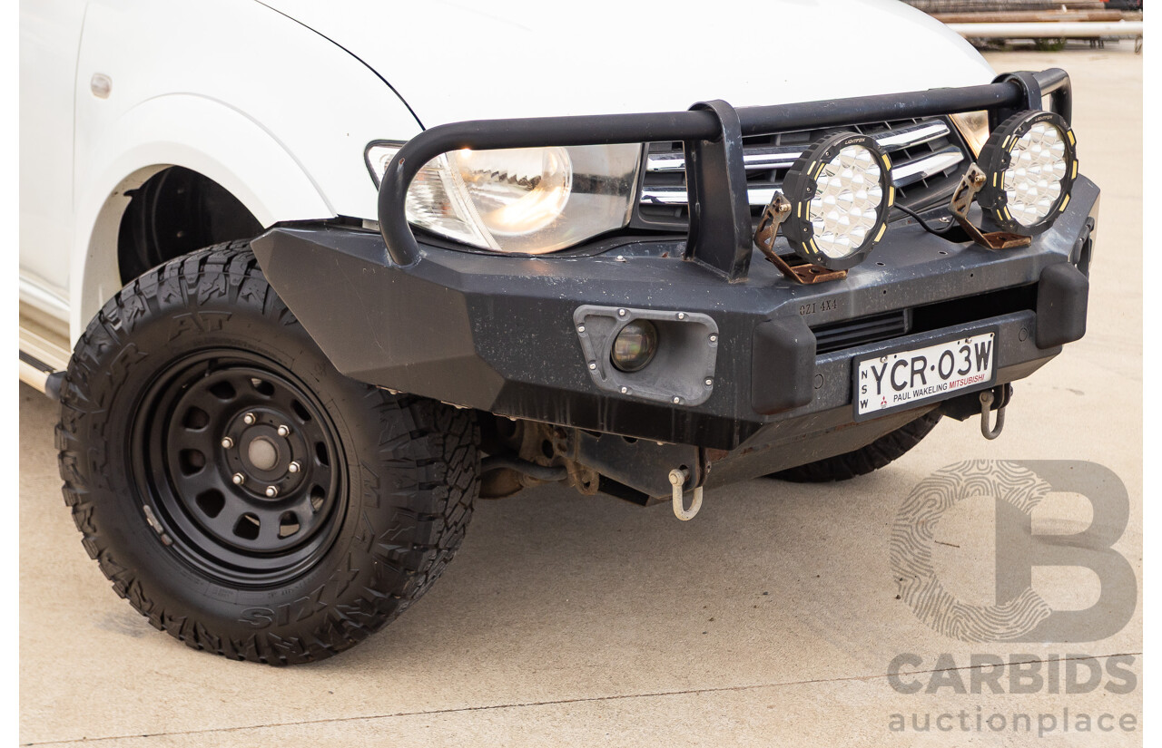 9/2014 Mitsubishi Triton GLX (4x4) MN MY14 UPDATE Double Cab Utility White Turbo Diesel 2.5L
