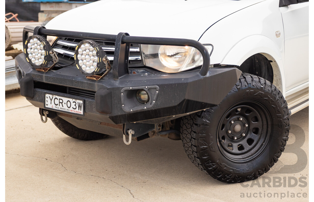 9/2014 Mitsubishi Triton GLX (4x4) MN MY14 UPDATE Double Cab Utility White Turbo Diesel 2.5L