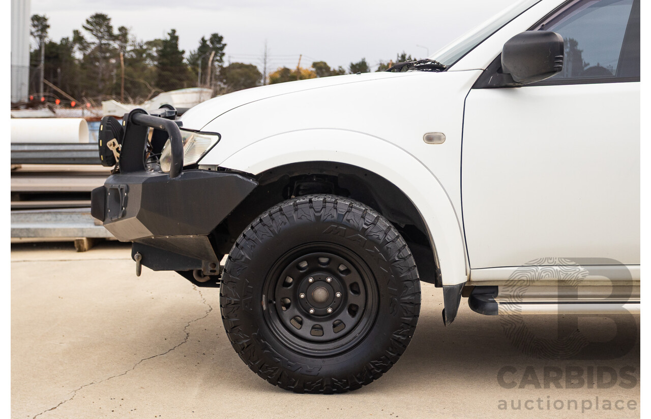 9/2014 Mitsubishi Triton GLX (4x4) MN MY14 UPDATE Double Cab Utility White Turbo Diesel 2.5L