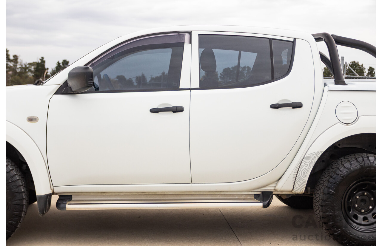 9/2014 Mitsubishi Triton GLX (4x4) MN MY14 UPDATE Double Cab Utility White Turbo Diesel 2.5L