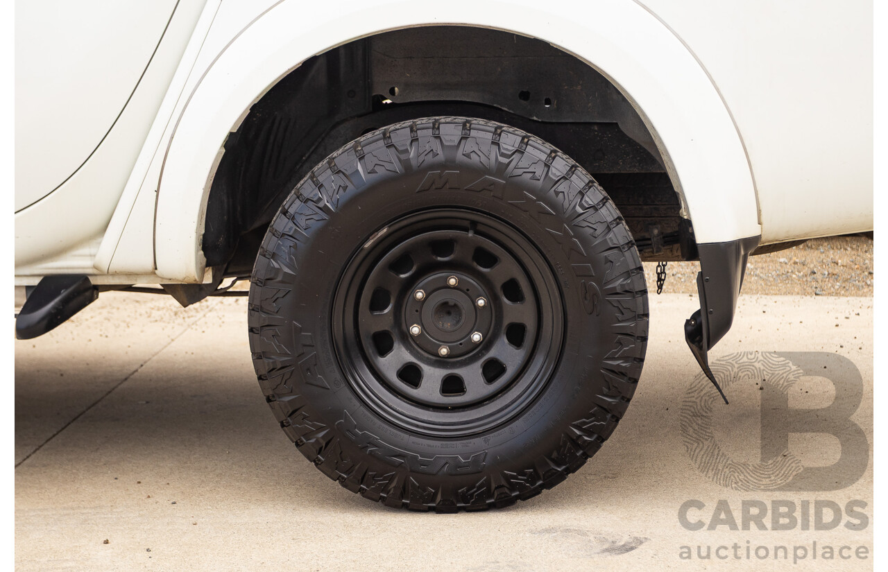 9/2014 Mitsubishi Triton GLX (4x4) MN MY14 UPDATE Double Cab Utility White Turbo Diesel 2.5L