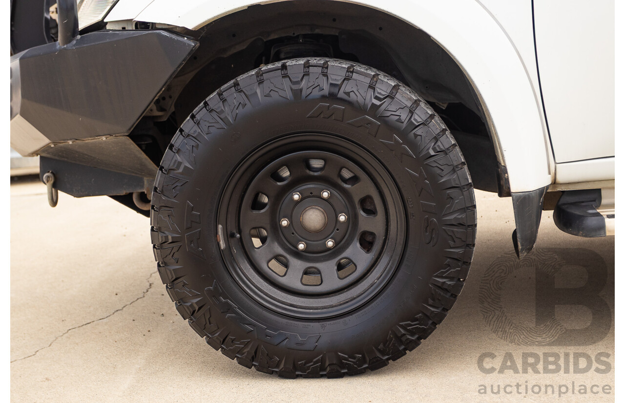 9/2014 Mitsubishi Triton GLX (4x4) MN MY14 UPDATE Double Cab Utility White Turbo Diesel 2.5L