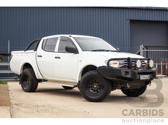 9/2014 Mitsubishi Triton GLX (4x4) MN MY14 UPDATE Double Cab Utility White Turbo Diesel 2.5L