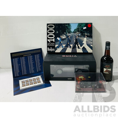 Collection of Memorabilia and Commemorative Items Including Yalumba “dulcify” 1979 Vintage Port, 100 Years of the Brownlow Stamp Set, Batmobile Display Piece From Batman 1989 and More