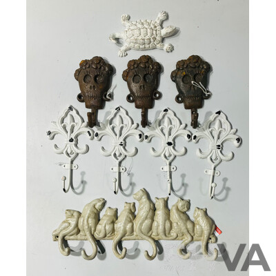 Collection of Painted Cast Iron Coat Hooks