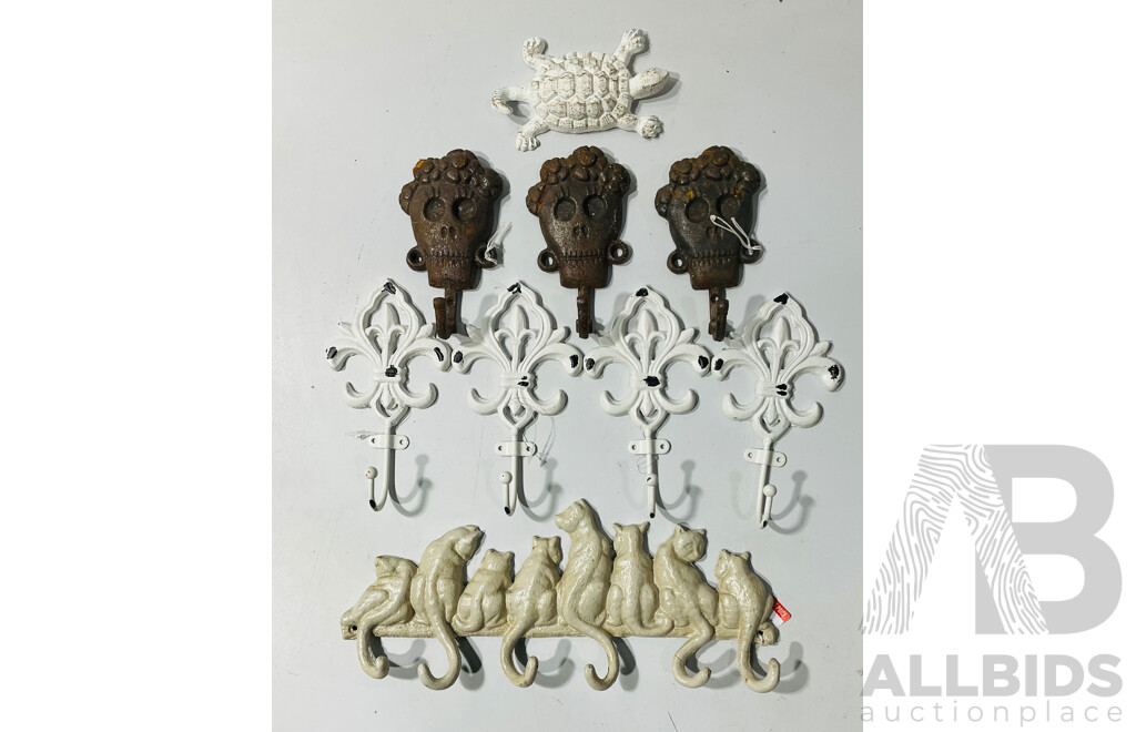 Collection of Painted Cast Iron Coat Hooks