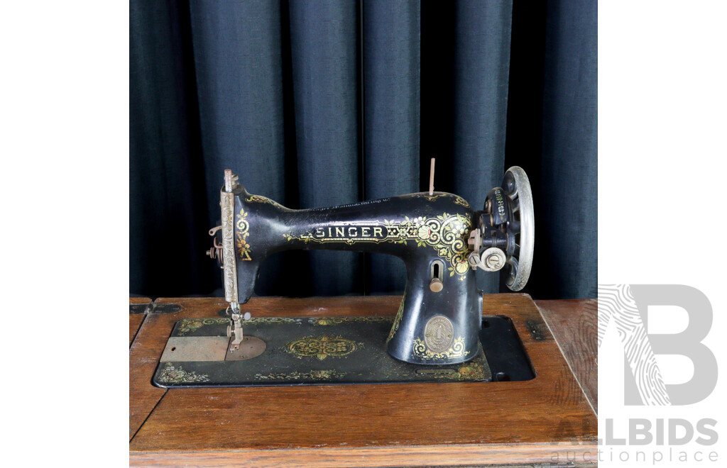 Singer Treadle Base Sewing Machine in Oak Case