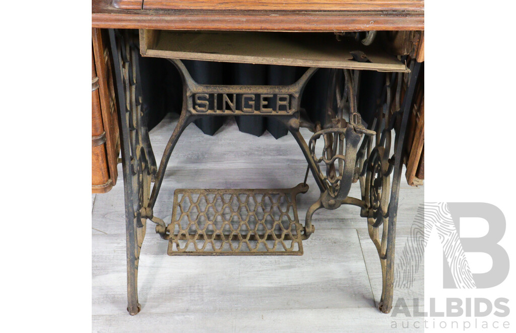 Singer Treadle Base Sewing Machine in Oak Case