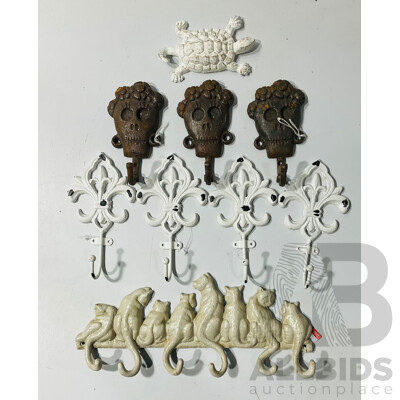 Collection of Painted Cast Iron Coat Hooks
