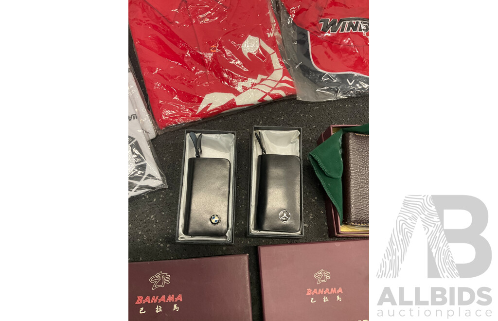 Assorted Bundle of Polo Tops (x10), Caps (x4), Wetsuit - Long Sleeve, Size M and L, Wallets (x4), Key Wallet (x2), Sunglasses (x20) and Can Coolers