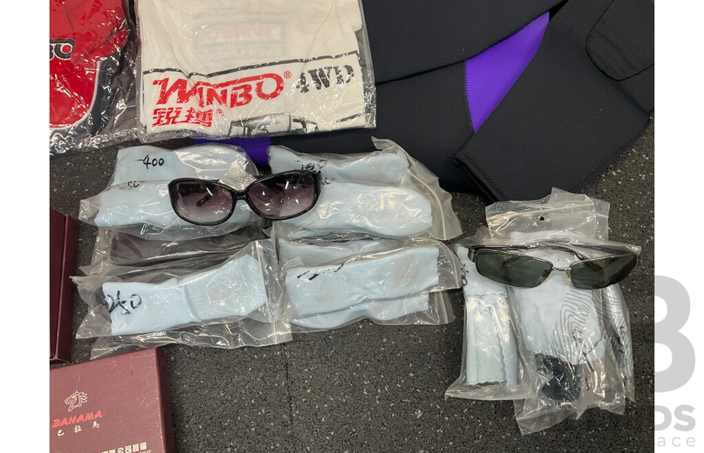 Assorted Bundle of Polo Tops (x10), Caps (x4), Wetsuit - Long Sleeve, Size M and L, Wallets (x4), Key Wallet (x2), Sunglasses (x20) and Can Coolers
