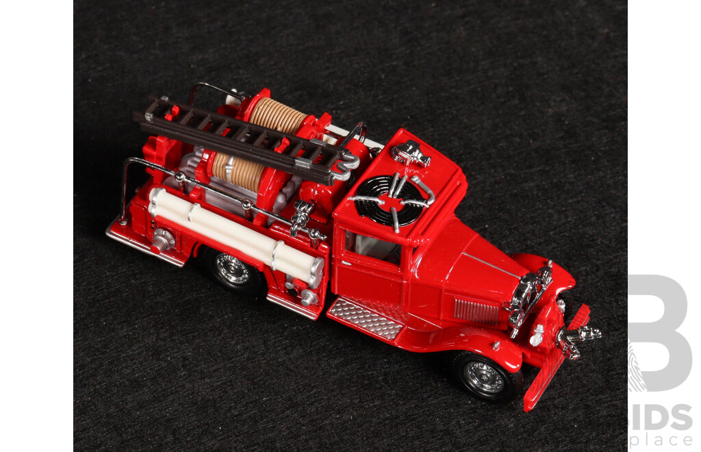 Two Vintage Matchbox Models of Yesteryear 1932 Ford AA Fire Engine and 1932 Mercedes-Benz Ladder Truck