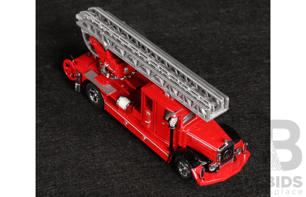 Two Vintage Matchbox Models of Yesteryear 1932 Ford AA Fire Engine and 1932 Mercedes-Benz Ladder Truck