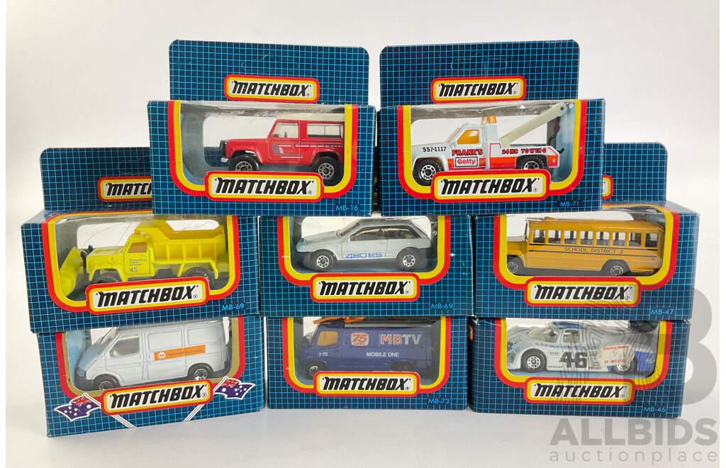 Eight Vintage Matchbox Vehicles Including Telecom Australia, School Bus, Sauber Group C, Volvo 480ES, GMC Wrecker, Land Rover 90