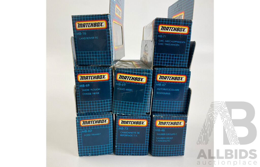 Eight Vintage Matchbox Vehicles Including Telecom Australia, School Bus, Sauber Group C, Volvo 480ES, GMC Wrecker, Land Rover 90
