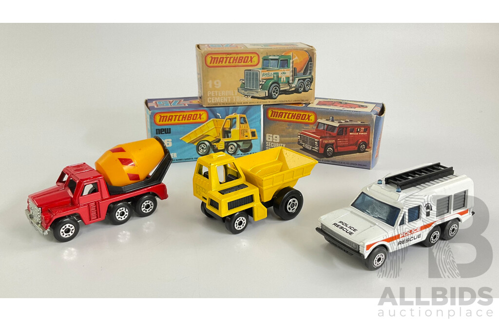 Three Matchbox 75 Super Fast Trucks Including Site Dumper, Peterbilt Cement Truck, Police Rescue