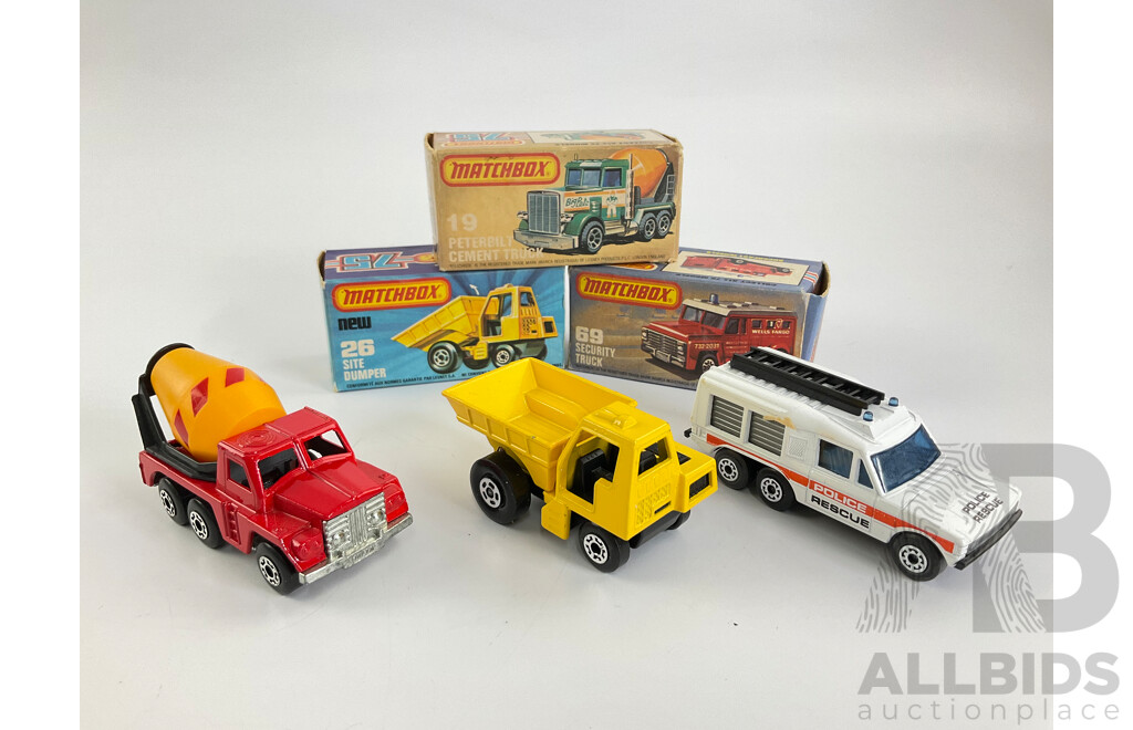 Three Matchbox 75 Super Fast Trucks Including Site Dumper, Peterbilt Cement Truck, Police Rescue