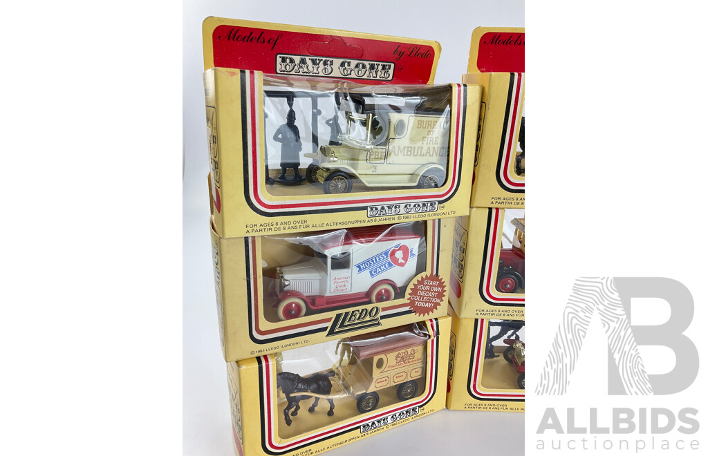 Twelve Lledo Models of Days Gone Promotional Trucks, Buses, Wagons and Figurines Including Philadelphia Bureau of Fire, Mitre Ten, Barton, Hostess Cake, British Bacon, CWM Dale Spring, Fine Lady Bakeries