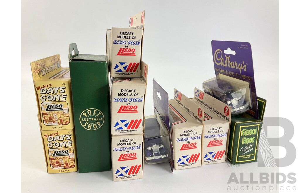 Collection of Diecast Trucks and Buses Including Days Gone 1986 Scotland Commonwealth Games, UK Buses, Cadbury's Rucks, Grace Brothers Removals Truck