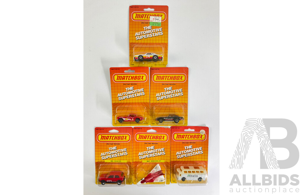1980's Matchbox 'The Automotive Superstars' Collection Including 1962 Corvette, VW Golf, Airport Coach, Chevrolet Corvette, Chevy Pro Stocker, Swing Wing Jet