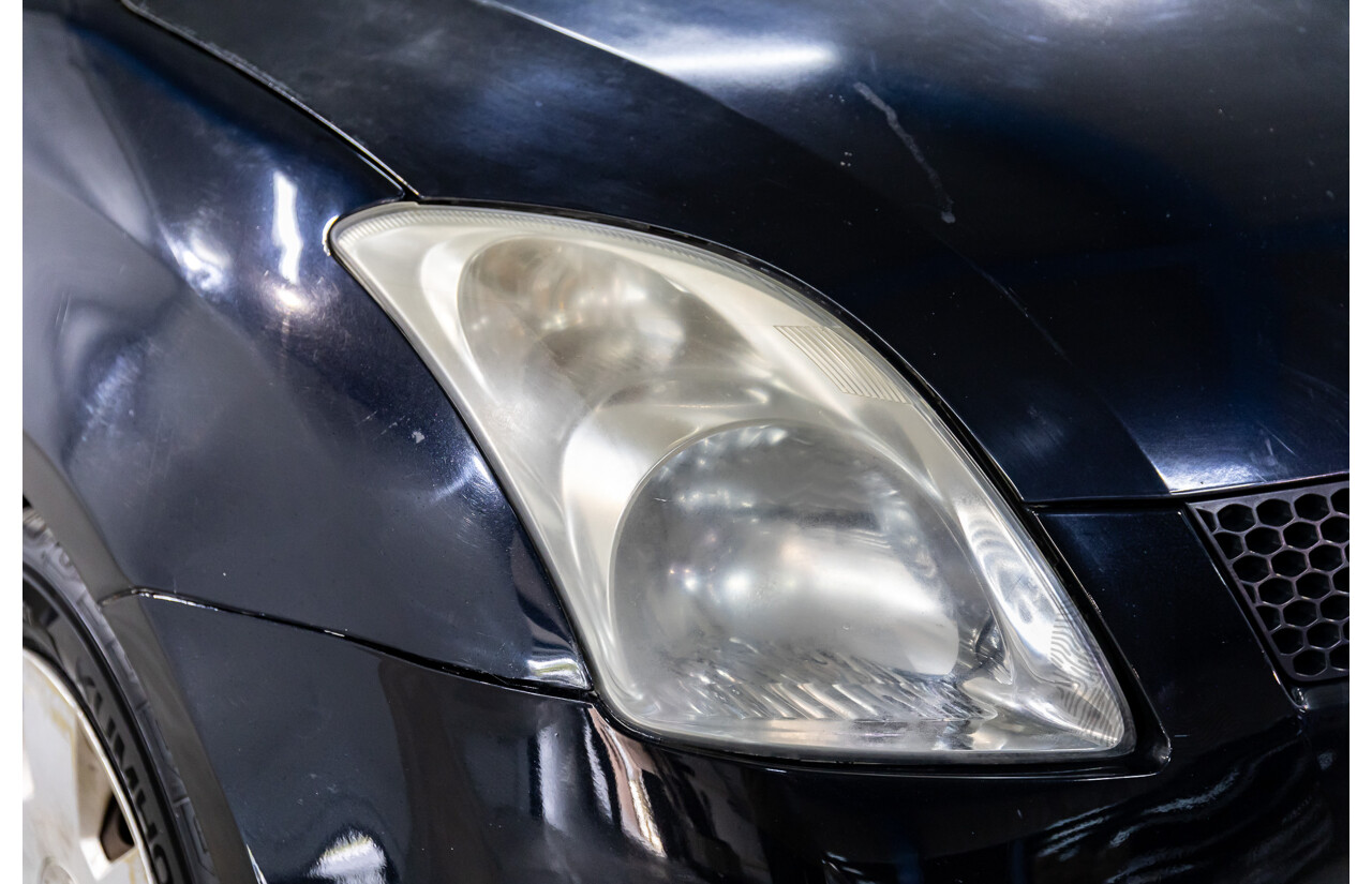 10/2006 Suzuki Swift EZ 5d Hatchback Bluish Black Metallic 1.5L